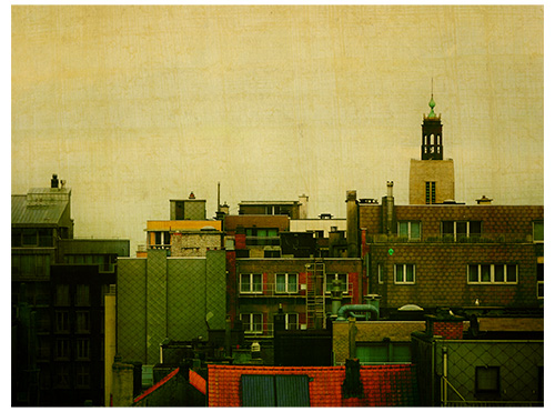 This picture belongs to the series "the coast". A view over the roofs of a city. This picture is pieced together.